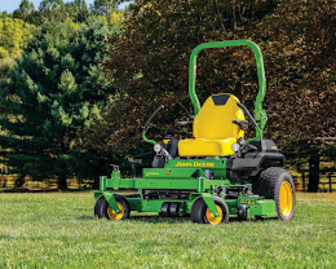 Green zero-turn mower on a lawn